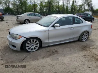 2009 BMW 1 Series 128i with VIN WBAUP73579VK74936, listed as a Copart auction lot 54558905 with 128,563 mi miles and Clean Title. Bid and sale history available at carsss.com. Image 1.