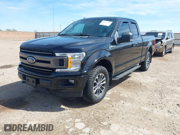 2018 Ford F-150 XL with VIN 1FTEX1EP7JFC21008, listed as a IAAI auction lot 42072145 with 102,679 mi miles and . Bid and sale history available at DreamBid. Image 2.