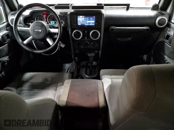 2008 Jeep Wrangler Unlimited Sahara z VIN 1J4GA59168L551767, wystawiony jako Copart lot #49809985 z przebiegiem 151 176 mil mil oraz Nie do naprawy • Non repairable. Historia ofert i sprzedaży dostępna na DreamBid. Obrazek 8.