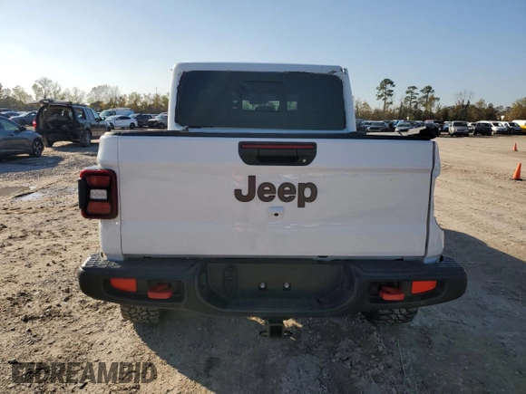 2022 Jeep Gladiator Rubicon with VIN 1C6JJTBG6NL142413, listed as a Copart auction lot 86098244 with 20,750 mi miles and Salvage title. Bid and sale history available at DreamBid. Image 6.