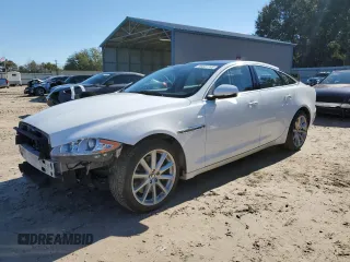 2013 Jaguar XJ with VIN SAJWJ1CD3D8V48059, listed as a Copart auction lot 88537745 with 139,706 mi miles and Salvage Title. Bid and sale history available at carsss.com. Image 1.