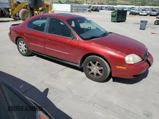 2000 Mercury Sable z VIN 1MEFM53U0YG640107, wystawiony jako Copart lot #56667855 z przebiegiem 146 403 mil mil oraz Szkody całkowita. Historia ofert i sprzedaży dostępna na DreamBid. Obrazek 4.