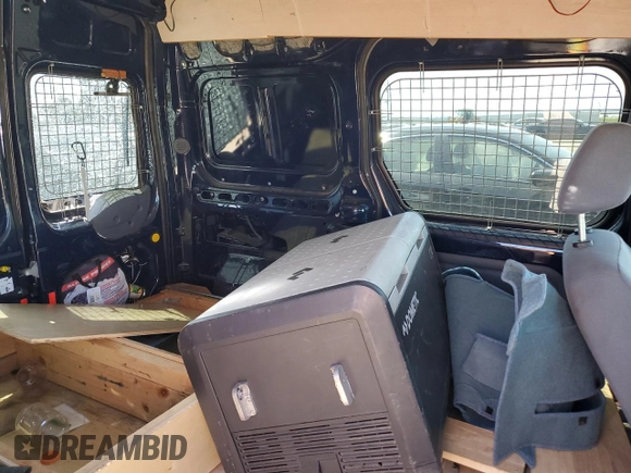 2010 Ford Transit Connect XLT с VIN NM0KS9BN6AT032660, выставлен на аукционе Copart как лот 59160965 с пробегом Не указан миль и Списание • Salvage title. История ставок и продаж доступна на DreamBid. Изображение 11.