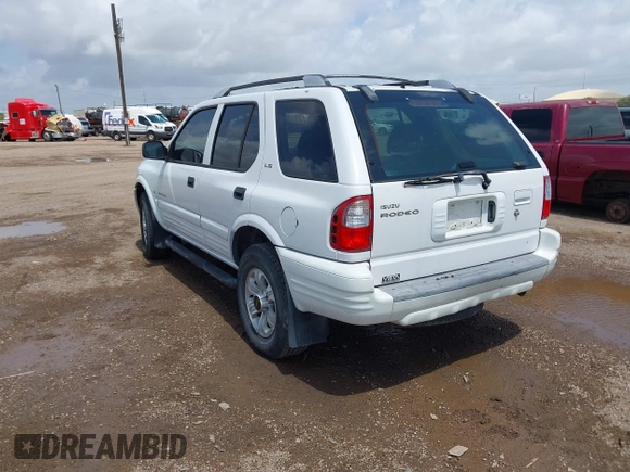 2001 Isuzu Rodeo S with VIN 4S2CK58W414357404, listed as a IAAI auction lot 42479053 with Not provided miles and . Bid and sale history available at DreamBid. Image 3.