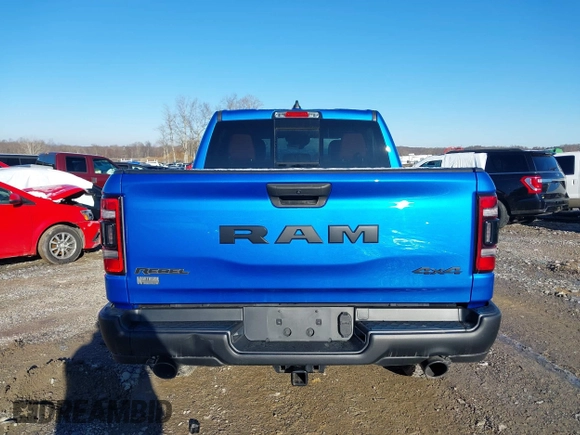 2022 Ram 1500 Rebel z VIN 1C6SRFLT0NN177124, wystawiony jako IAAI lot #41575076 z przebiegiem 40 065 mil mil oraz . Historia ofert i sprzedaży dostępna na DreamBid. Obrazek 16.