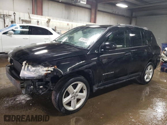 2014 Jeep Compass Latitude with VIN 1C4NJCEA2ED887736, listed as a Copart auction lot 51675375 with 103,403 mi miles and Salvage Title. Bid and sale history available at carsss.com. Image 1.