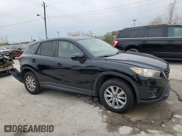 2016 Mazda CX-5 Sport with VIN JM3KE2BE7G0690233, listed as a Copart auction lot 80093354 with 117,234 mi miles and Salvage Title. Bid and sale history available at carsss.com. Image 4.