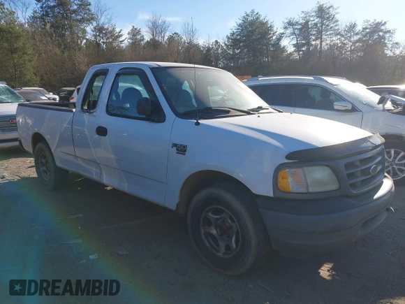 2003 Ford F-150 XL with VIN 1FTRX17W33NA66469, listed as a IAAI auction lot 41677909 with 236,619 mi miles. Bid and sale history available at carsss.com. Image 6.