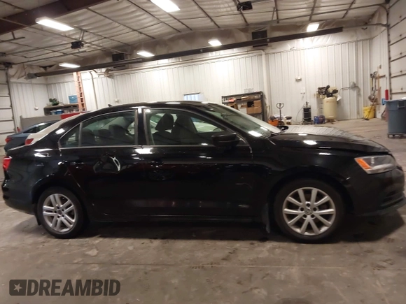 2015 Volkswagen Jetta S with VIN 3VW2K7AJ4FM243087, listed as a IAAI auction lot 42525961 with 118,224 mi miles and . Bid and sale history available at DreamBid. Image 14.