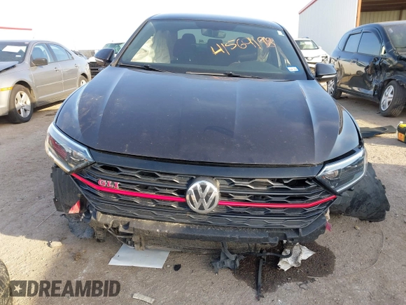 2019 Volkswagen Jetta GLI S z VIN 3VW5T7BU3KM245927, wystawiony jako IAAI lot #41573257 z przebiegiem 57 322 mil mil oraz . Historia ofert i sprzedaży dostępna na DreamBid. Obrazek 6.