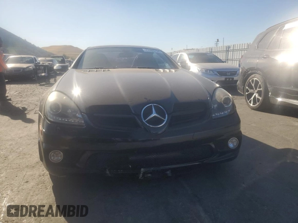 2006 Mercedes-Benz SLK-Class 5.5L AMG with VIN WDBWK73F16F093516, listed as a Copart auction lot 77485754 with 112,419 mi miles and Salvage Title. Bid and sale history available at carsss.com. Image 5.