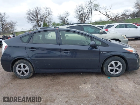 2015 Toyota Prius Four with VIN JTDKN3DU5F0433864, listed as a IAAI auction lot 42106791 with 113,989 mi miles and . Bid and sale history available at DreamBid. Image 13.