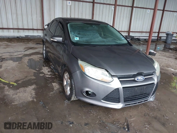 2013 Ford Focus SE with VIN 1FADP3F29DL243937, listed as a IAAI auction lot 42145911 with 90,376 mi miles and . Bid and sale history available at DreamBid. Image 1.