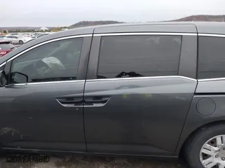 2013 Honda Odyssey LX with VIN 5FNRL5H24DB042230, listed as a IAAI auction lot 40954067 with 212,154 mi miles. Bid and sale history available at carsss.com. Image 15.