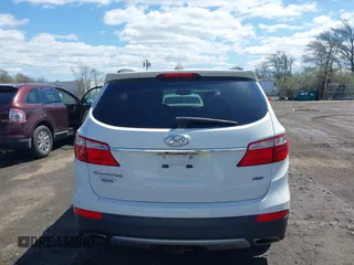 2014 Hyundai Santa Fe Limited z VIN KM8SNDHF8EU080086, wystawiony jako IAAI lot #41995020 z przebiegiem 168 532 mil mil oraz . Historia ofert i sprzedaży dostępna na DreamBid. Obrazek 16.