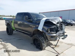 2018 Ram 2500 Laramie with VIN 3C6UR5FLXJG391586, listed as a IAAI auction lot 41581822 with 70,403 mi miles and . Bid and sale history available at DreamBid. Image 1.