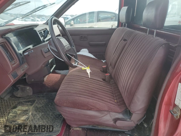 1993 Nissan Frontier z VIN 1N6SD11S0PC332903, wystawiony jako Copart lot #84039484 z przebiegiem 136 324 mil mil oraz Szkoda całkowita • Salvage title. Historia ofert i sprzedaży dostępna na DreamBid. Obrazek 7.