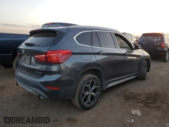 2018 BMW X1 xDrive28i with VIN WBXHT3C38J3H33310, listed as a Copart auction lot 73492324 with 88,620 mi miles and Salvage Title. Bid and sale history available at carsss.com. Image 3.