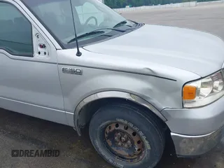 2007 Ford F-150 XLT with VIN 1FTRW12W07KD31575, listed as a IAAI auction lot 42278748 with 140,852 mi miles and . Bid and sale history available at DreamBid. Image 12.