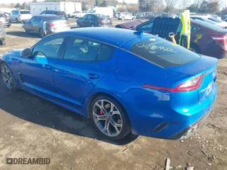 2019 Kia Stinger GT with VIN KNAE35LC3K6061517, listed as a IAAI auction lot 41394312 with 57,318 mi miles. Bid and sale history available at carsss.com. Image 3.