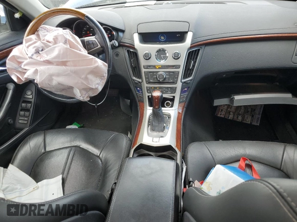 2014 Cadillac CTS with VIN 1G6DH8E3XE0134312, listed as a Copart auction lot 61556874 with 77,194 mi miles and Salvage Title. Bid and sale history available at DreamBid. Image 8.