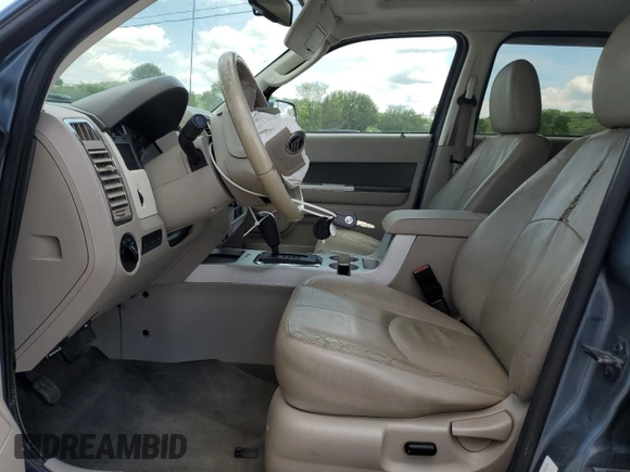 2010 Mercury Mariner Premier с VIN 4M2CN9HG9AKJ29987, выставлен на аукционе Copart как лот 55459505 с пробегом 123 447 миль миль и Списание • Salvage title. История ставок и продаж доступна на DreamBid. Изображение 7.