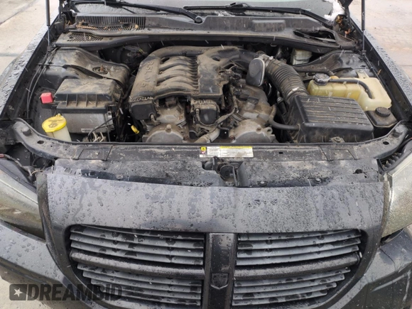 2005 Dodge Magnum SE z VIN 2D4FV48V55H529419, wystawiony jako Copart lot #53908645 z przebiegiem 176 793 mil mil oraz Szkoda całkowita • Salvage title. Historia ofert i sprzedaży dostępna na DreamBid. Obrazek 12.