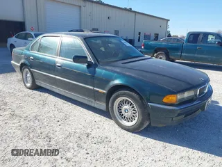 1998 BMW 7 Series 740il with VIN WBAGJ8323WDM13455, listed as a IAAI auction lot 41888636 with 1 mi miles. Bid and sale history available at carsss.com. Image 1.