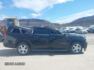 2015 Chevrolet Suburban LTZ with VIN 1GNSKKKC9FR280390, listed as a IAAI auction lot 41882449 with 80,499 mi miles and . Bid and sale history available at DreamBid. Image 13.