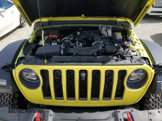 2022 Jeep Wrangler Unlimited Rubicon with VIN 1C4HJXFG3NW214174, listed as a Copart auction lot 74136484 with 5,292 mi miles and Salvage title. Bid and sale history available at DreamBid. Image 11.