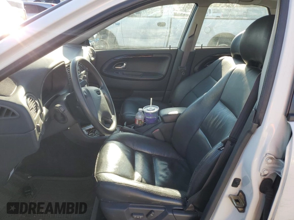 2002 Volvo S40 with VIN YV1VS29542F821073, listed as a Copart auction lot 87377204 with 57,474 mi miles and Salvage Title. Bid and sale history available at carsss.com. Image 7.