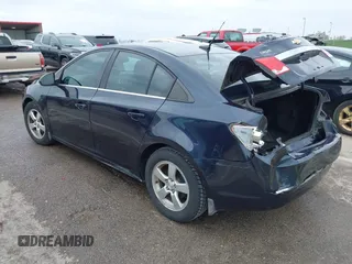 2014 Chevrolet Cruze 1LT with VIN 1G1PC5SB5E7400967, listed as a IAAI auction lot 41976254 with 143,068 mi miles and . Bid and sale history available at DreamBid. Image 3.