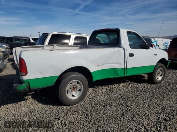 1998 Ford F-150 with VIN 1FTZF1821WKB21778, listed as a Copart auction lot 73009444 with 220,898 mi miles and Salvage title. Bid and sale history available at DreamBid. Image 3.