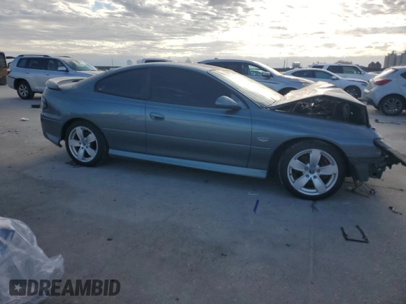 2005 Pontiac GTO with VIN 6G2VX12U75L457697, listed as a Copart auction lot 84683564 with 57,504 mi miles and Salvage Title. Bid and sale history available at carsss.com. Image 4.