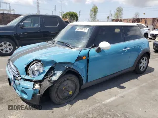 2010 MINI Hardtop with VIN WMWMF3C54ATZ24561, listed as a Copart auction lot 50991395 with 105,356 mi miles and Salvage Title. Bid and sale history available at DreamBid. Image 1.
