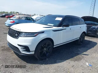2020 Land Rover Range Rover Velar R-Dynamic S z VIN SALYK2EX4LA272072, wystawiony jako IAAI lot #41910957 z przebiegiem 63 823 mil mil oraz . Historia ofert i sprzedaży dostępna na DreamBid. Obrazek 18.