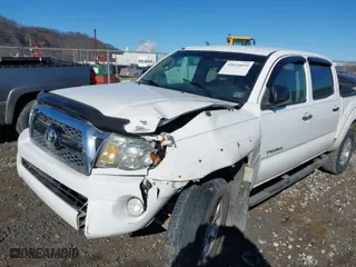 2011 Toyota Tacoma with VIN 3TMLU4EN0BM064052, listed as a IAAI auction lot 41423819 with 185,729 mi miles. Bid and sale history available at carsss.com. Image 6.
