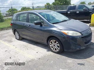 2012 Mazda 5 Sport with VIN JM1CW2BL8C0131745, listed as a IAAI auction lot 42625411 with 194,875 mi miles and . Bid and sale history available at DreamBid. Image 1.