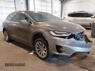 2016 Tesla Model X 70D with VIN 5YJXCBE27GF004974, listed as a IAAI auction lot 41630556 with 167,709 mi miles. Bid and sale history available at carsss.com. Image 1.