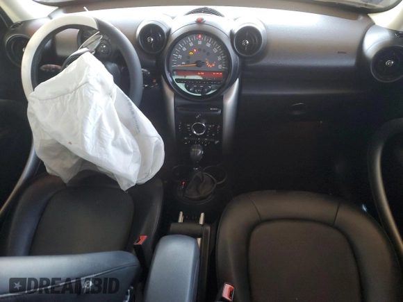 2015 MINI Countryman with VIN WMWZB3C50FWR45253, listed as a Copart auction lot 63608655 with 123,701 mi miles and Salvage title. Bid and sale history available at DreamBid. Image 8.