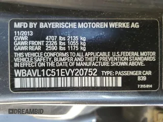 2014 BMW X1 xDrive28i with VIN WBAVL1C51EVY20752, listed as a Copart auction lot 52236685 with 130,956 mi miles and Clean Title. Bid and sale history available at carsss.com. Image 13.