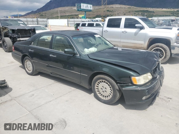 1999 Infiniti Q45 z VIN JNKBY31A6XM600579, wystawiony jako Copart lot #57683075 z przebiegiem 215 415 mil mil oraz Szkoda całkowita • Salvage title. Historia ofert i sprzedaży dostępna na DreamBid. Obrazek 4.