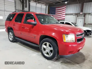 2011 Chevrolet Tahoe LS with VIN 1GNSCAE00BR320455, listed as a Copart auction lot 54782325 with 202,936 mi miles and Salvage title. Bid and sale history available at DreamBid. Image 4.