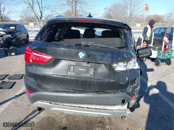 2017 BMW X1 xDrive28i with VIN WBXHT3C37H5F82992, listed as a IAAI auction lot 41293740 with 161,418 mi miles. Bid and sale history available at carsss.com. Image 16.