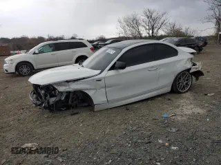 2011 BMW 1 Series 135i with VIN WBAUC9C58BVM10505, listed as a Copart auction lot 82564374 with 123,144 mi miles and Salvage title. Bid and sale history available at DreamBid. Image 1.