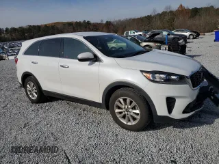 2020 Kia Sorento LX z VIN 5XYPG4A54LG620991, wystawiony jako Copart lot #83208104 z przebiegiem 77 189 mil mil oraz Szkoda całkowita • Salvage title. Historia ofert i sprzedaży dostępna na DreamBid. Obrazek 4.