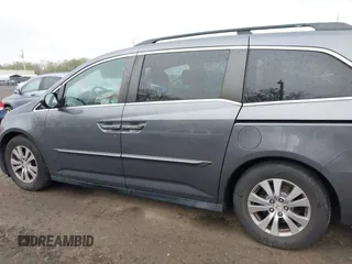 2014 Honda Odyssey EX-L with VIN 5FNRL5H63EB033684, listed as a IAAI auction lot 42025249 with 128,017 mi miles and . Bid and sale history available at carsss.com. Image 14.