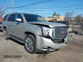 2016 GMC Yukon Denali with VIN 1GKS2CKJ5GR393269, listed as a IAAI auction lot 41963630 with 158,584 mi miles. Bid and sale history available at carsss.com. Image 1.