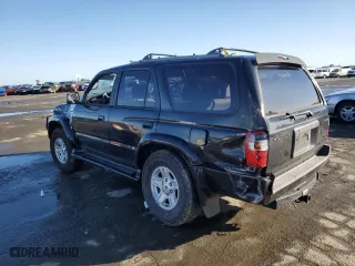 2000 Toyota 4Runner SR5 with VIN JT3HN86R1Y0317584, listed as a Copart auction lot 44157355 with 199,957 mi miles and Salvage Title. Bid and sale history available at carsss.com. Image 2.