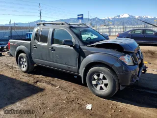 2011 Nissan Frontier PRO-4X with VIN 1N6AD0EV9BC414521, listed as a Copart auction lot 80242924 with 0 mi miles and Salvage Title. Bid and sale history available at carsss.com. Image 4.
